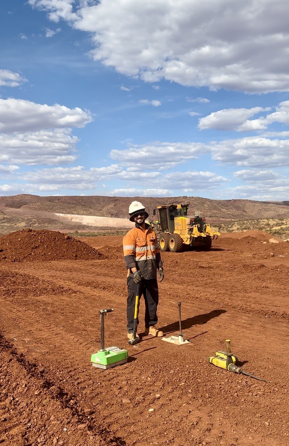 Dimitrios V. Smirnich working as a geotechnician on an Australian mine site