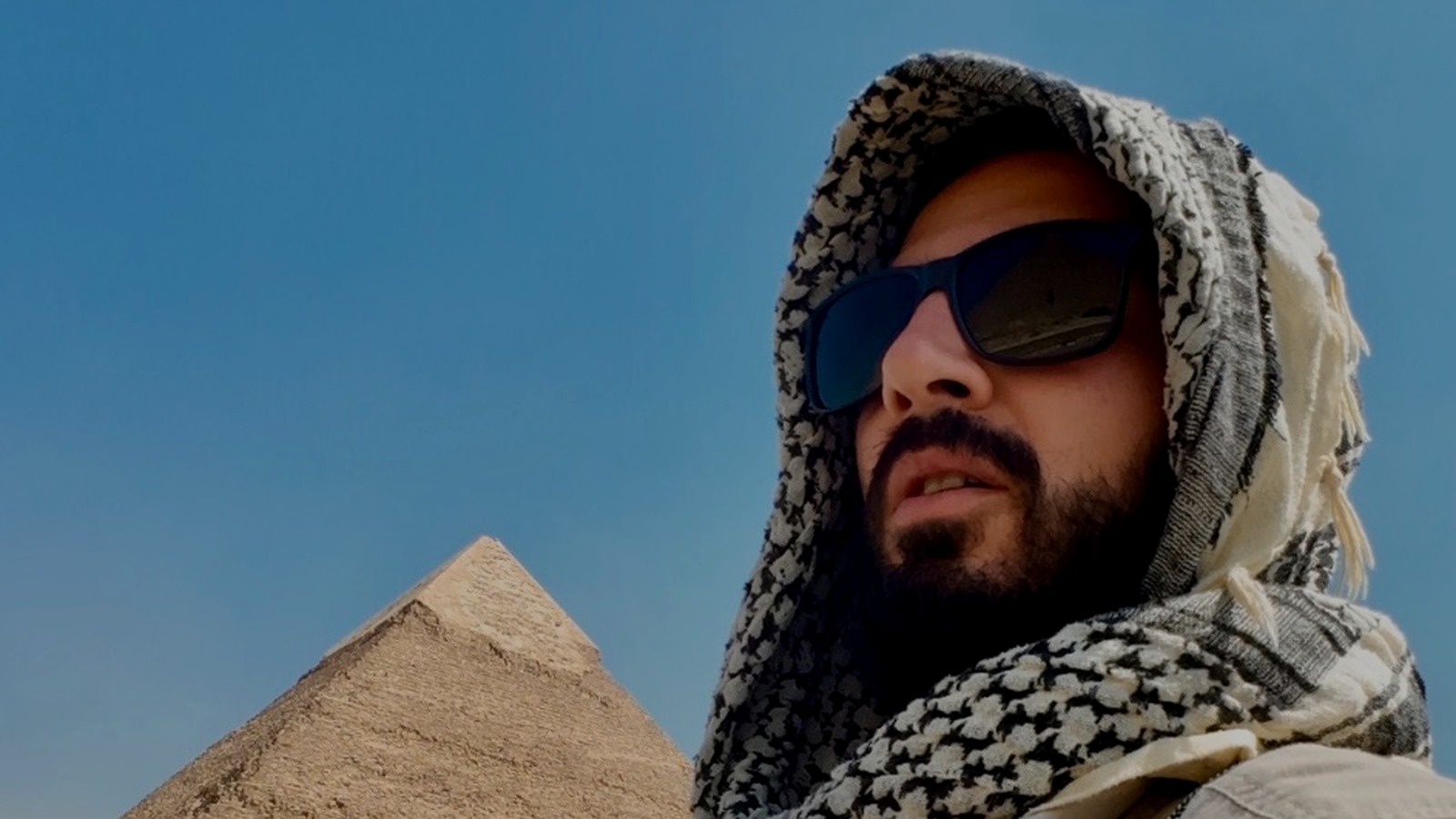 Dimitrios V. Smirnich in Egypt with a pyramid in the background